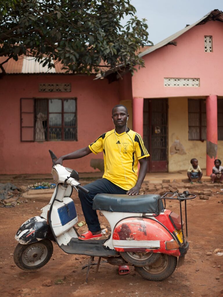 A man posing with his Vespa T5