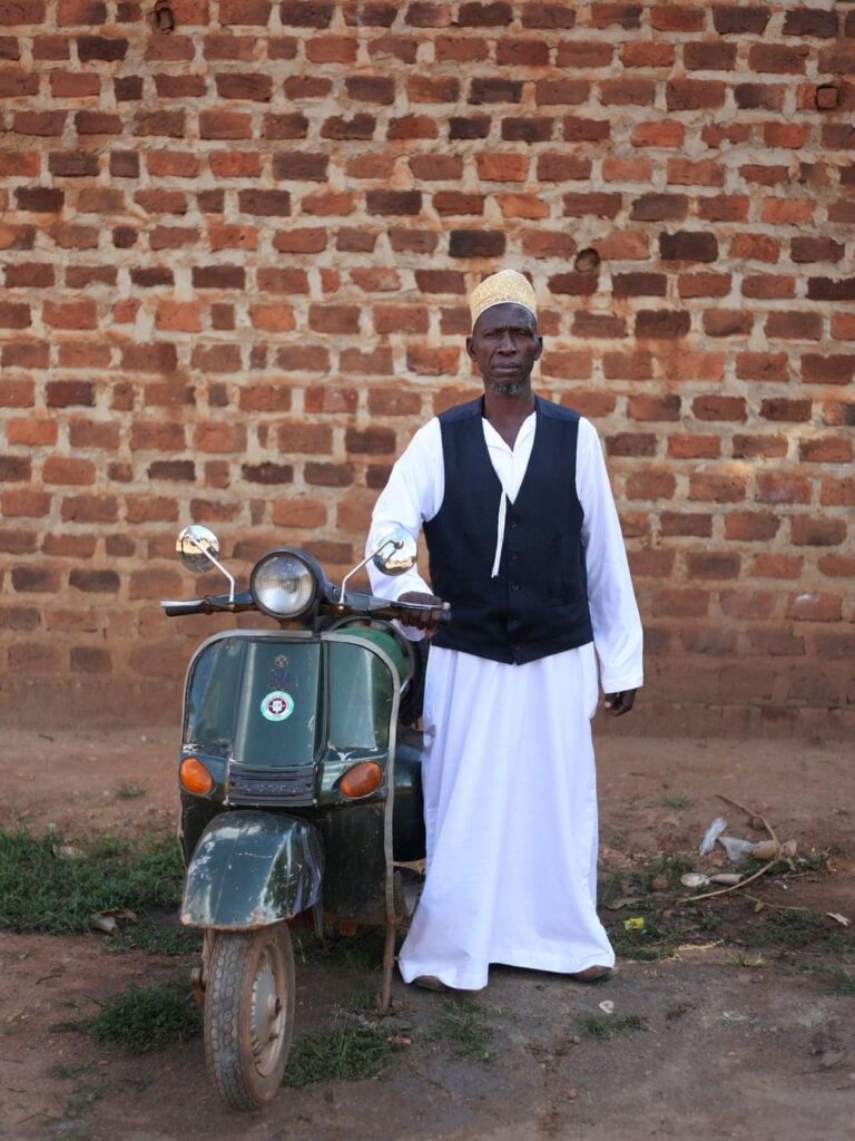A member of the Muslim community with his Vespa