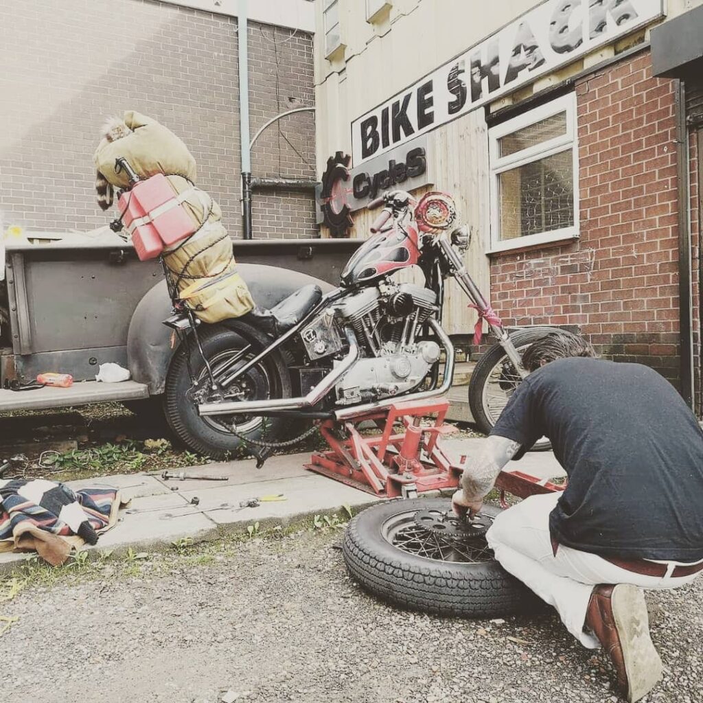 Tinkering with a rusty relic in the shape of a motorbike